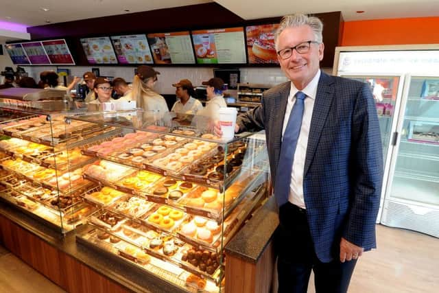 Date:  12th August 2015. Picture James Hardisty, (JH1009/78a)  Nigel Travis, CEO of Dunkin Brands, at the opening of the first ever Dunkin Donuts store in the UK outside of London on Woodhouse Lane, Leeds, next to the Pryzm Nightclub.