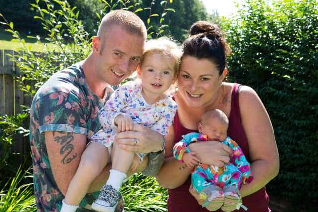 Richard and Amy Cade, with two-year-old Connie and baby Nellie, born at Halifax Agricultural Show