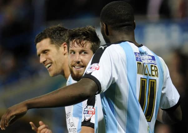 Jacob Butterfield celebrates his equaliser for 
Huddersfield Town v Brighton & Hove Albion.