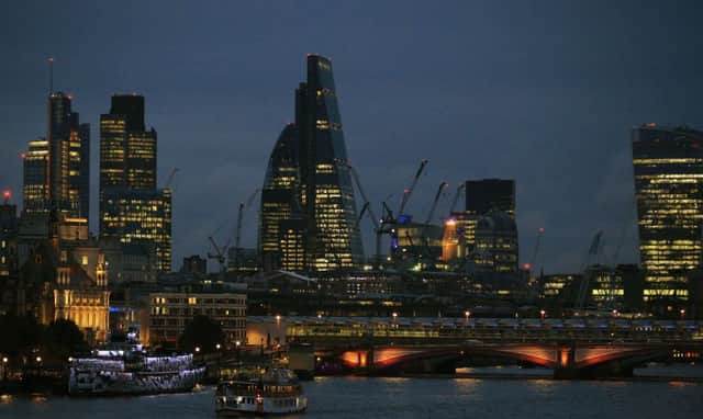 The City of London skyline at dust  Photo: Jonathan Brady/PA Wire