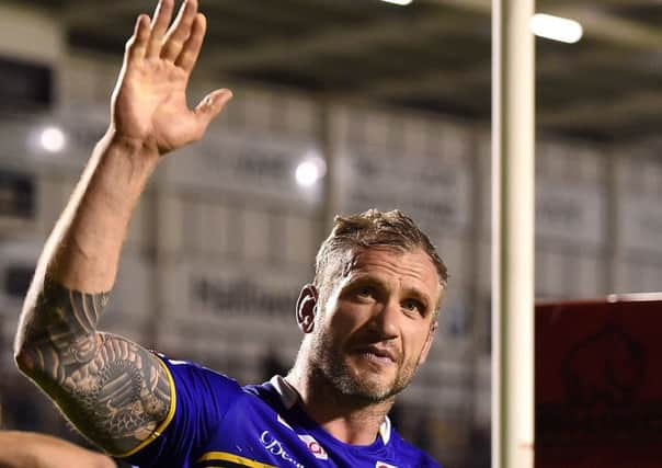 Leeds Rhinos' Jamie Peacock salutes the fans after his team's 24-14 win against St Helens