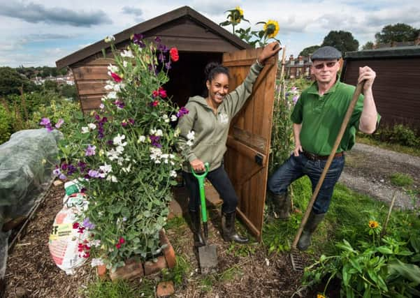 Lauren Gill from Kith & Kin with allotment owner Tony Reap