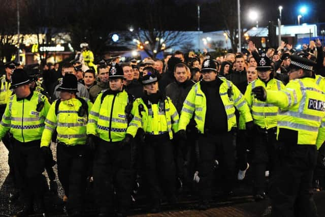 Police have warned it is getting harder to meet the cost of covering football matches