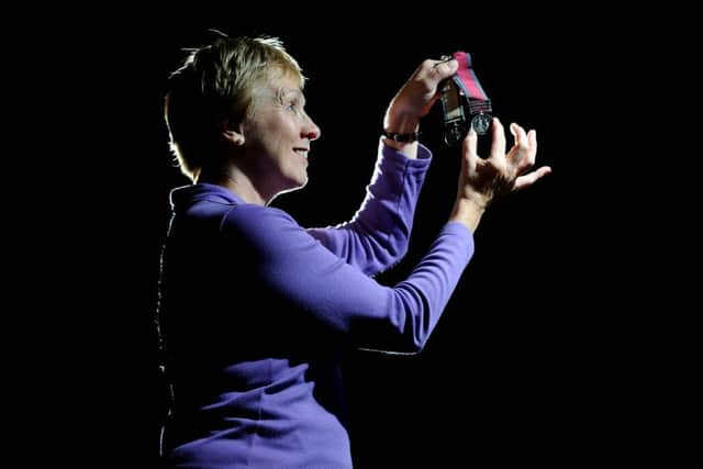 Oonagh Drage, military specialist at Tennants Auctioneers, holds the pair of rare Peninsula War medals awarded to Patrick Campbell.  Pictures: James Hardisty (JH1010/47b)