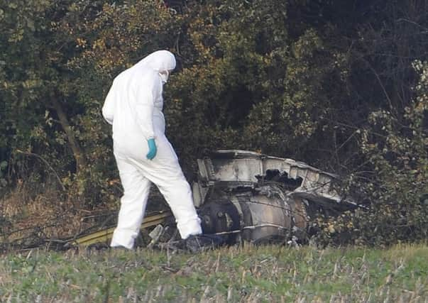 The scene of a light aircraft crash in a field off Gravel Lane in Chigwell