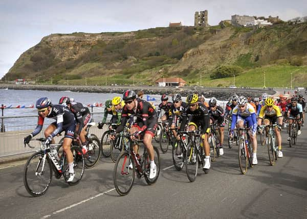 The cyclists ride to the finish at Scarborough's North Bay in the 2015 Tour de Yorkshire