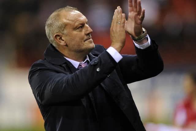 Neil Redfearn applauds the 
Rotherham fans after the 1-1 draw.