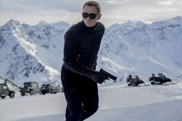 Daniel Craig as James Bond.