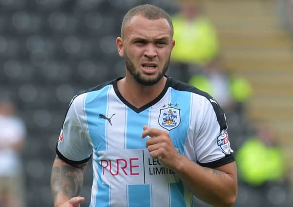 Joel Lynch believes Huddersfield Towns youngsters will prosper if, like him, they are thrown in at the deep end (Picture: PA).