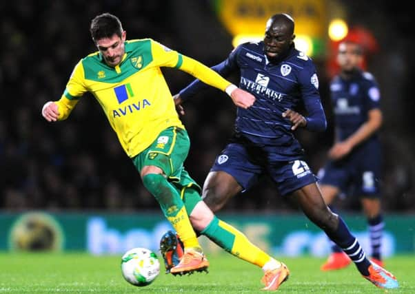 Kyle Lafferty battles with Souleymane Doukara.