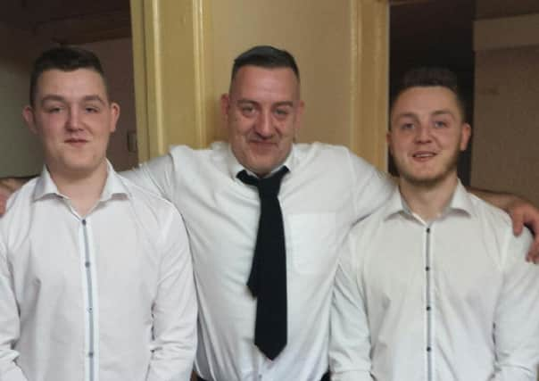 Dave Batchelor with sons Brandon (left) and Jordan (right)