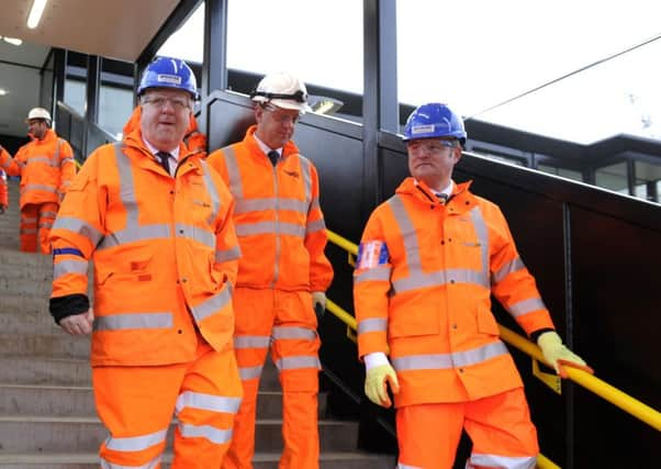 Patrick McLoughlin Transport Secretary at Kirkstall Forge Station with Stuart Andrew MP. 7 December 2015.  Picture Bruce Rollinson