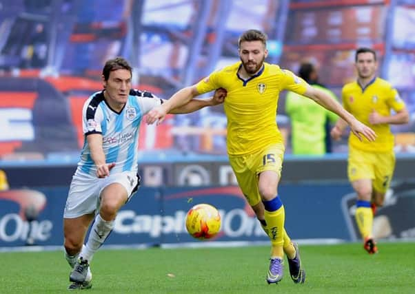 Huddersfield Town's  Dean Whitehead, left.