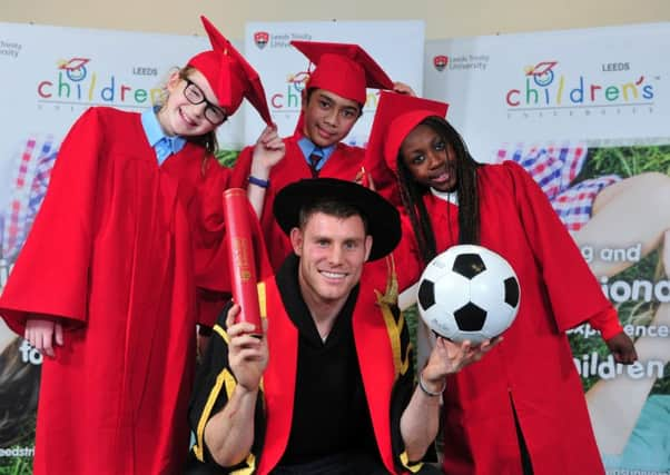 Chancellor James Milner with young students Aldora Zadworna, Luis Jurada and Rodica Koffi-Ebah at Leeds Trinity University in Horsforth. Picture Tony Johnson