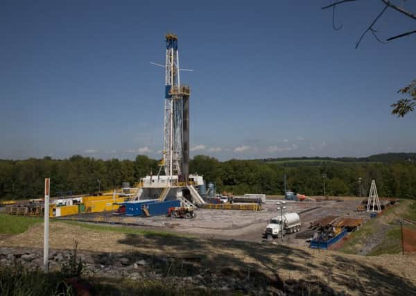 Fracking rigs like this one are a common site in America.