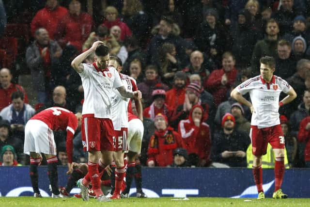 Sheffield United's players show their frustration after Manchester United are awarded a late penalty at Old Trafford on Saturday. Picture: Sport Image.