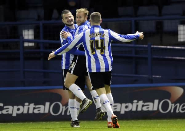 On-loan striker Gary Hooper celebrates after netting twice last night to help Sheffield Wednesday beat Bolton 3-2 at Hillsborough (Picture: Steven Ellis).