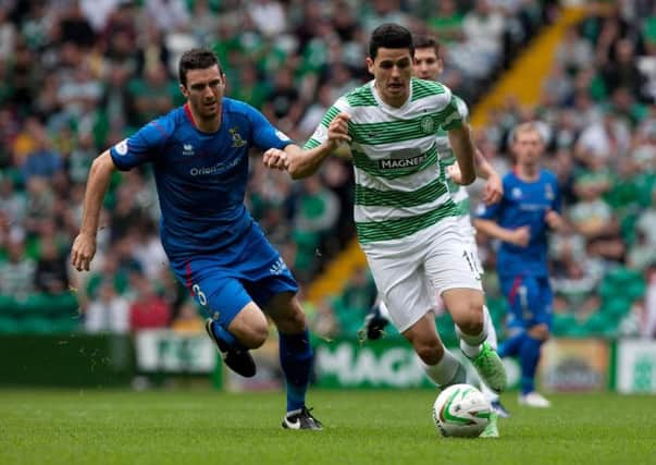 Tom Rogic, right.