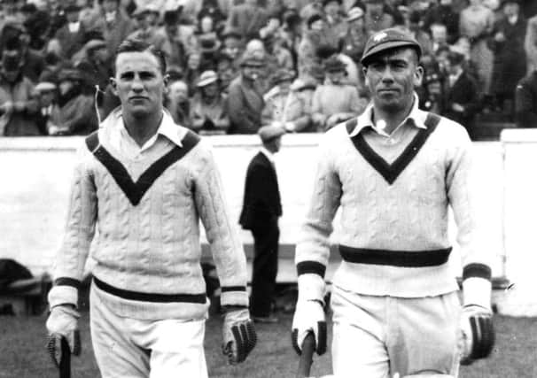 Yorkshires Arthur Ticker Mitchell, seen right walking out to bat with Len Hutton, had seemed less than keen to act as a last-minute replacement for England back in 1935.