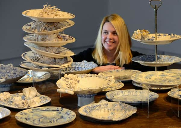 'The Forgotten Potteries of the Dearne Valley' exhibition has opened at The Cooper Gallery in Barnsley. Barnsley Museums' Tracey Hebron with some of the contemporary pieces commisioned for the show. Pictures: Scott Merrylees