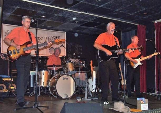 Buddy Holly fan Denis Jones (singing) with his band Collier Dixon Line