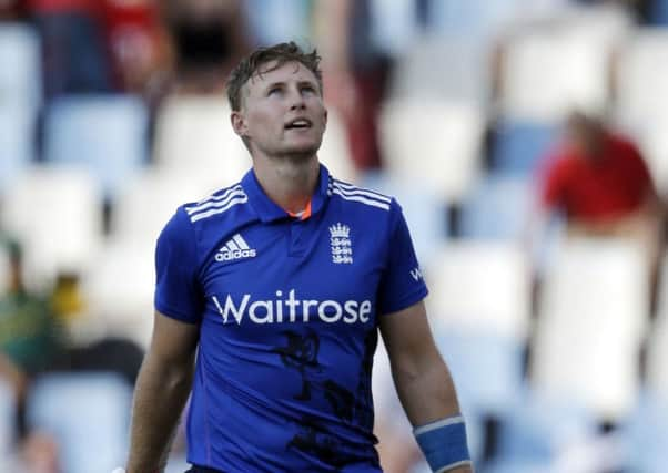 Englands batsman Joe Root looks up after reaching his century during the third One Day International cricket match between South Africa and England. (AP Photo/Themba Hadebe)