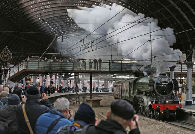 The Flying Scotsman, painted in its traditional colours, passes through York for a run to Scarborough ahead of its inaugural journey from Kings Cross to York later this week.