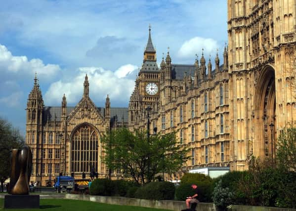 File photo dated 29/04/13 of the Houses of Parliament in Westminster, central London as the watchdog responsible for MPs' pay and perks is to set out its plans to introduce an 11% pay rise amid threats that the controversial proposals could lead to the organisation being axed. PRESS ASSOCIATION Photo. Issue date: Thursday December 12, 2013. Opposition leader Ed Miliband has called on David Cameron and Nick Clegg to accompany him to a meeting with the Independent Parliamentary Standards Authority (Ipsa) to demand it halts the wage hike. The Prime Minister has yet to agree to the move but yesterday issued a veiled threat to abolish Ipsa if it presses ahead with the planned rise after the 2015 general election, insisting it was "simply unacceptable" that Members' salaries would increase increasing by Â£7,600 to Â£74,000. See PA story POLITICS Expenses. Photo credit should read: Sean Dempsey/PA Wire