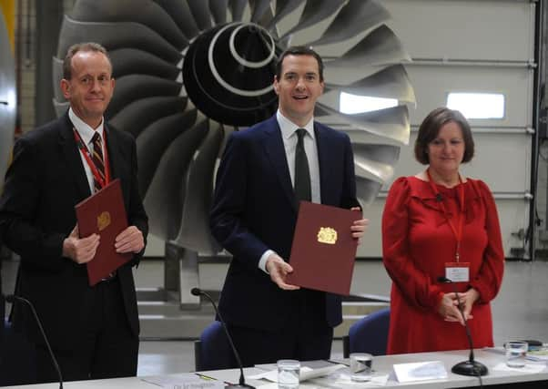 Sheffield Council leader Julie Dore at the signing of the draft devolution deal with George Osborne and Barnsley Council leader Sir Steve Houghton last year