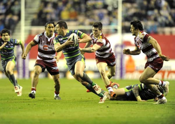 Brett Ferres drives forward.