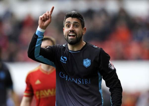 Sub Marco Matais salutes his goal which secured a 3-0 away win at Forest (Picture: Steve Ellis)