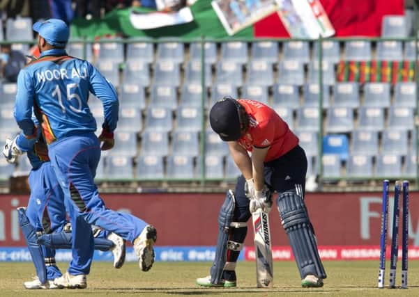 ON YOUR WAY: Joe Root reacts after his dismissal against Afghanistan, but England recovered to win by 15 runs in New Delhi. Picture: AP/Manish Swarup.