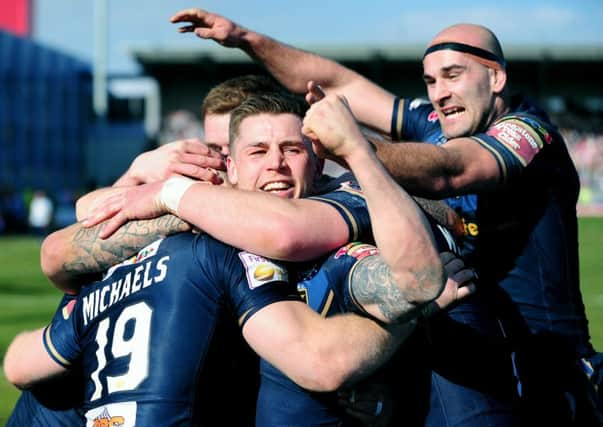 Hull FCs jubilant players celebrate Steve Michaels winning try in the Hull derby. The Airlie Birds found themselves 20-0 down with 20 minutes to go before rallying to snatch victory from Rovers. (Picture: Jonathan Gawthorpe)