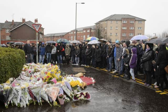 A vigil has been held in Glasgow for the well-respected Muslim shopkeeper who was killed in what police are treating as a "religiously prejudiced" attack.