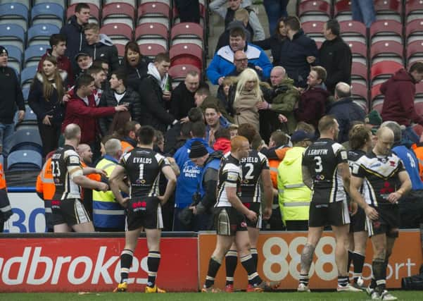 Trouble breaks out in the Salford end at the end of the match.