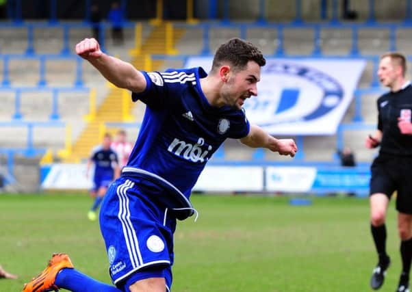 Connor Hughes scored a late consolation goal for FC Halifax Town at Barrow. Picture: Jonathan Gawthorpe