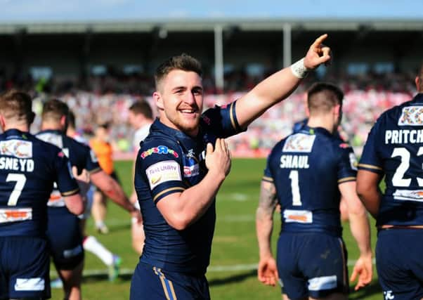 Hull FC's Curtis Naughton celebrates Steve Michaels winning try against Hull KR.