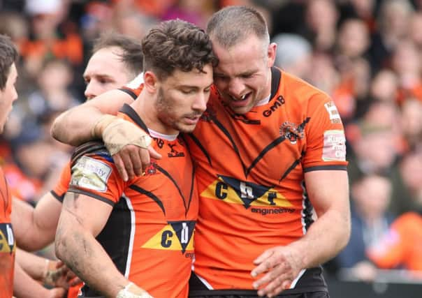 Andy Lynch congratulates Jy Hinchcox for his try on the stroke of half time.