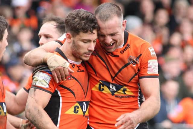 Andy Lynch congratulates Jy Hinchcox for his try on the stroke of half time.