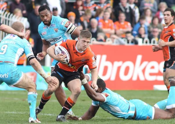 Castlefords Ryan Hampshire is halted by the Huddersfield Giants defence (Picture: Andy May)