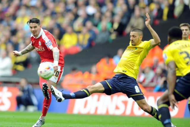 Adam Hammill fires home the third goal. (Picture: Tony Johnson)