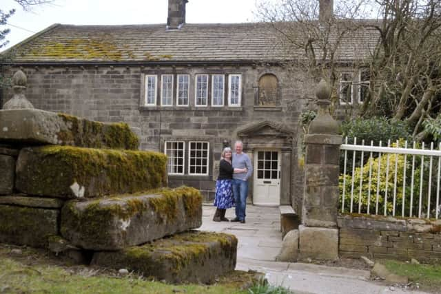 Steve Brown and Julie Akhurst outside Ponden Hall, their home and B&B