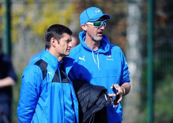 Yorkshire CCC coach Jason Gillespie chats to director of cricket, Martyn Moxon. during a pre-season nets session. 
Picture: Jonathan Gawthorpe.