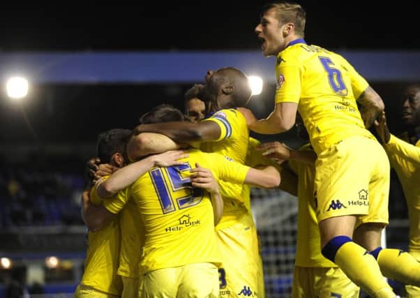 Leeds and Stuart Dallas celebrates his second goal in front of the travelling fans.
Birmingham City v Leeds United.  SkyBet Championship.  12 April 2016.  Picture Bruce Rollinson