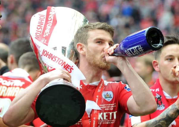 Sam Winnall celebrates at Wembley.