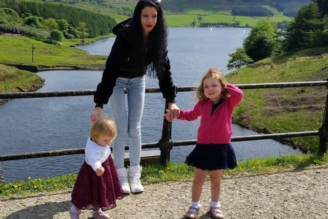 Samira Lupidi with one-year-old Jasmine Weaver (left) and three-year-old Evelyn Lupidi. Picture: Ross Parry Agency