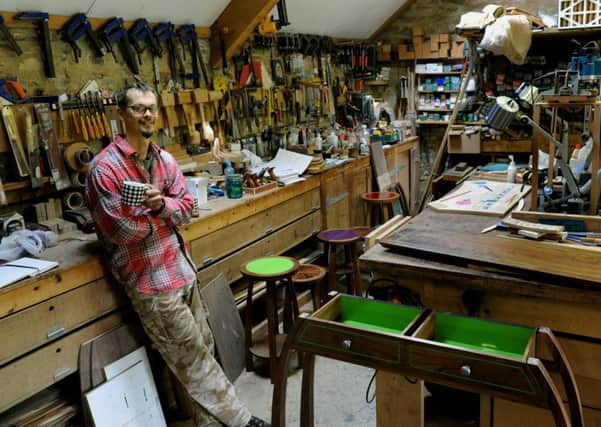 Sam in his workshop behind the family home and B&B