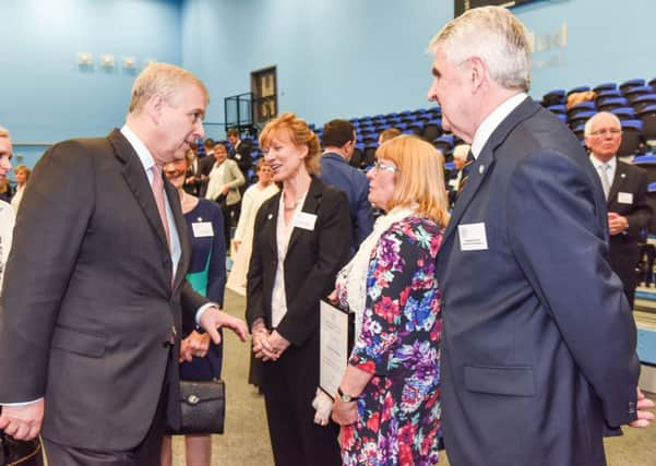 Ilkley Good Neighbours were presented with the Duke of York Community Initiative Award at a ceremony in Huddersfield last week.  Pictured from left, are: the Duke of York, chairman Judy Hutton, treasurer Josephine Loughran,   volunteer ShopAssist co-ordinator  Wendy Cubie, and ShopAssist volunteer Malcolm Mitchell. Picture: Simon Dewhurst