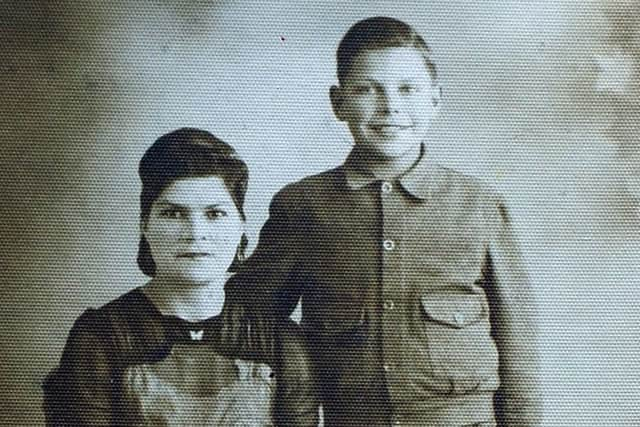 Frank Inman pictured with his mother Violet in the 1940s wearing his siren suit.
 
Picture : Jonathan Gawthorpe