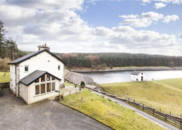 Standrise House with views across the reservoir